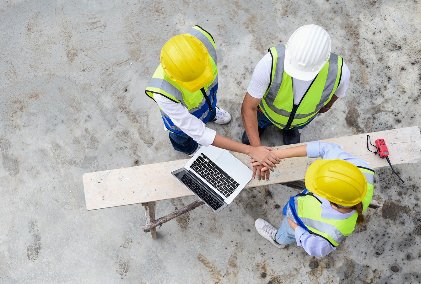 Construction workers gathered in a team brief